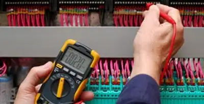 electrical service showing professional testing and troubleshooting of electrical panel by licensed electricians in Scottsdale, AZ