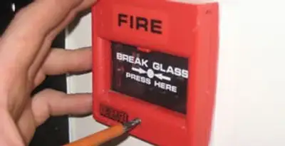 fire alarm installation service showing manual fire alarm pull station installed by licensed electricians in Scottsdale, AZ