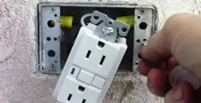 gfci circuits service showing installation of a ground fault circuit interrupter outlet by licensed electricians in Scottsdale, AZ