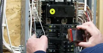 Home electrical inspection of circuit breaker panel by licensed electrician in Scottsdale, AZ