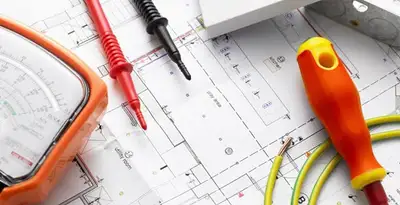 licensed electrician planning and testing electrical systems using professional tools in Scottsdale, AZ